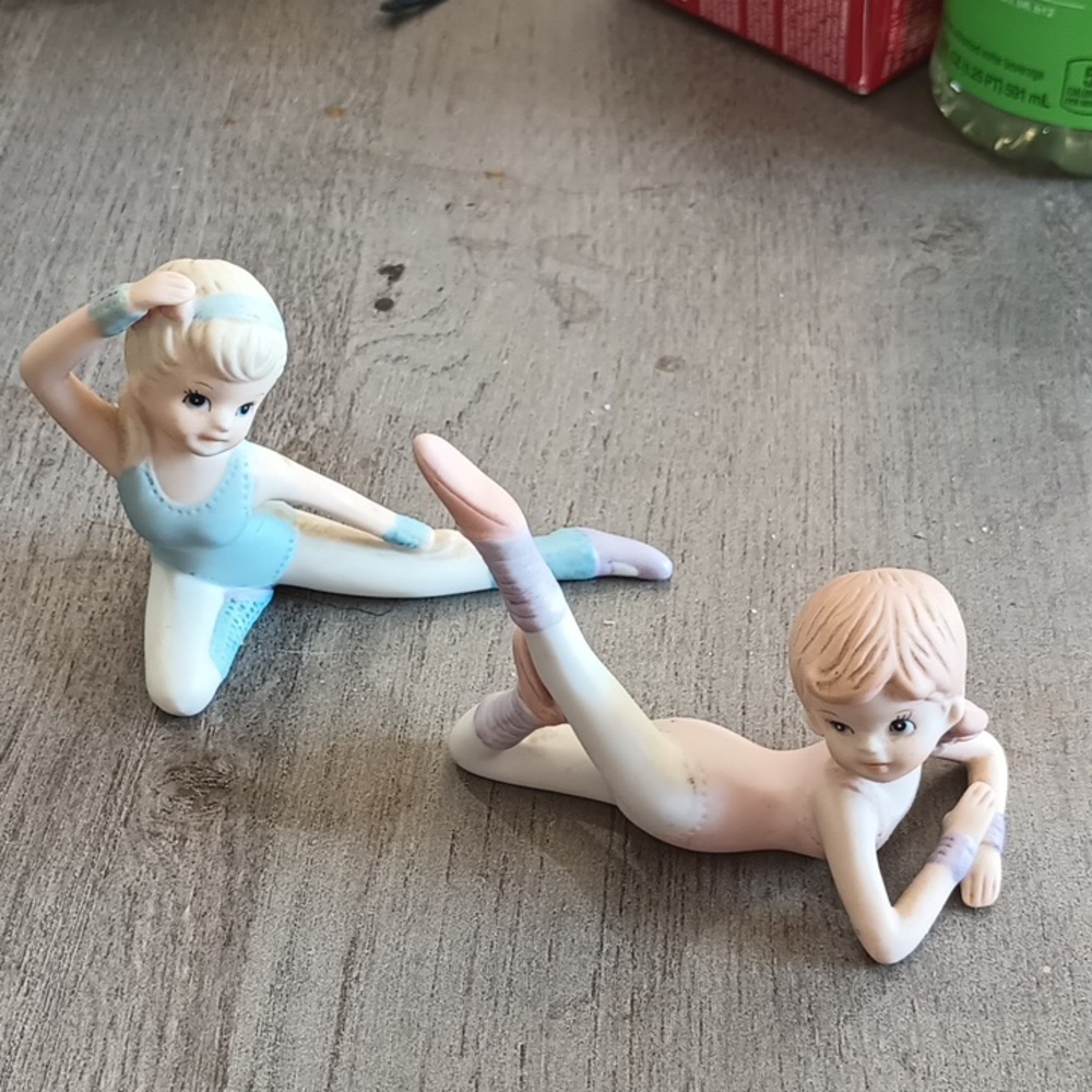 Glass dancing figurines